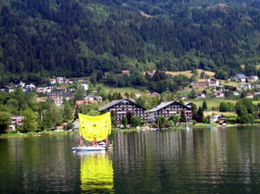 Отель Seeblick Appartement ADRIAN im Haus Hänsel & Gretel direkt am Ossiacher See  Штайндорф-Ам-Оссиахер-Зее